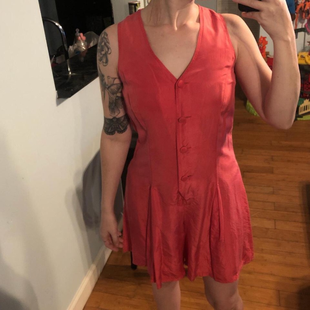 Jonathan Martin 100% silk romper with button up front and pockets